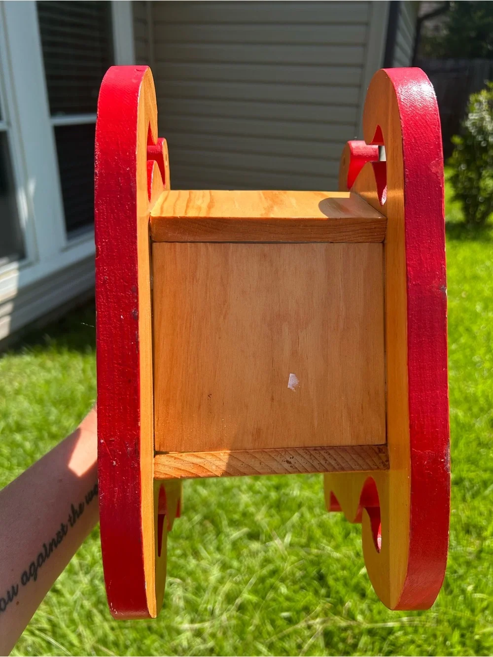 Festive Red and Wood Holiday Sleigh Décor